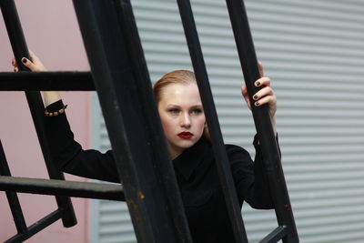 Portrait of a woman on stairs