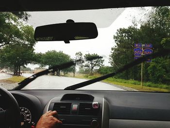 Cropped image of car on road