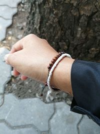 Close-up of woman holding hand