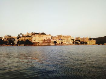 River by city against clear sky