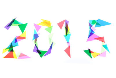 High angle view of multi colored umbrellas against white background