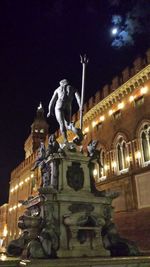 Low angle view of illuminated street light