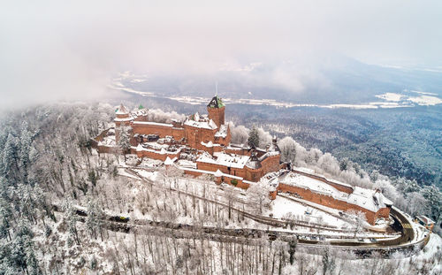 High angle view of traditional building against sky during winter