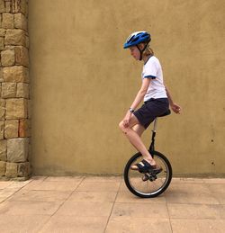 Girl riding a unicycle