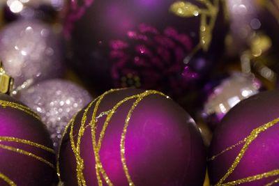Close-up of christmas ornaments at night