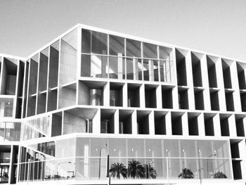 Low angle view of modern building against clear sky