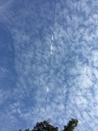 Low angle view of vapor trail in sky