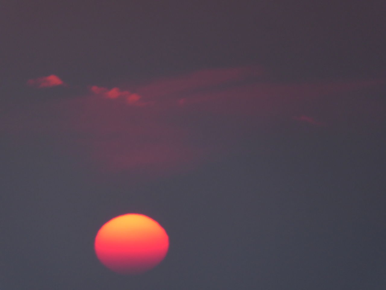 LOW ANGLE VIEW OF ORANGE SKY DURING SUNSET