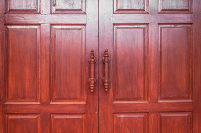 Architectural detail of a vintage brass door handle ,vintage antique door handle 