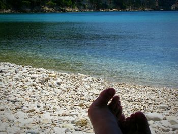 Low section of woman on beach