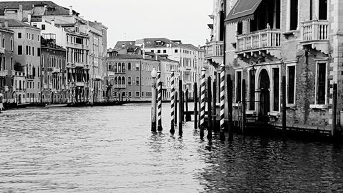 View of canal with buildings in background