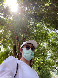 Low angle view of woman in park