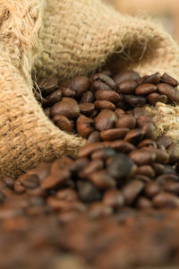 Close-up of coffee beans on table