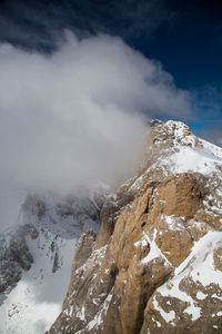 Scenic view of snowcapped mountains against sky. punta rocca. dolomites. italy