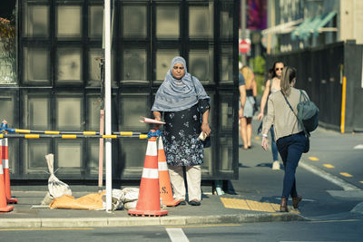 People on street in city