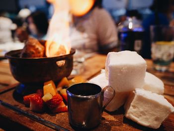Close-up of preparing food on table