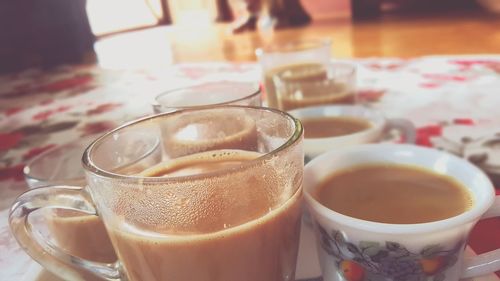 Close-up of coffee cup on table