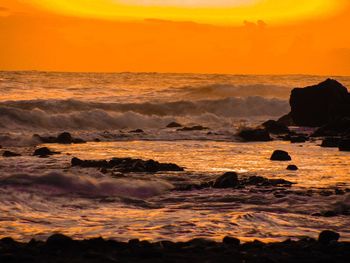 Scenic view of sea against sky during sunset