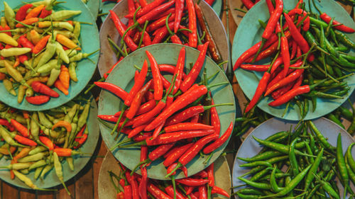 High angle view of red chili peppers for sale at market