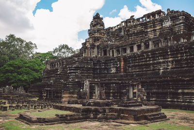 Old temple building against sky