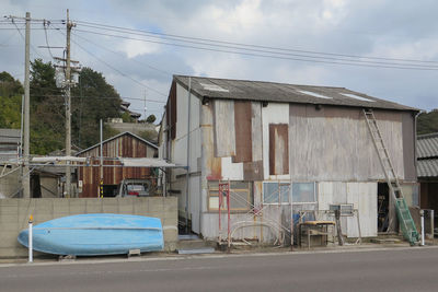 Houses against sky in city