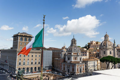 Buildings in city against sky