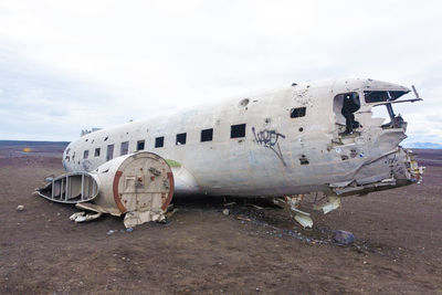 Abandoned airplane on beach