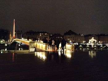 Illuminated cityscape at night