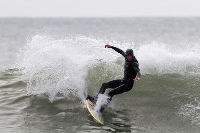Man surfing in sea
