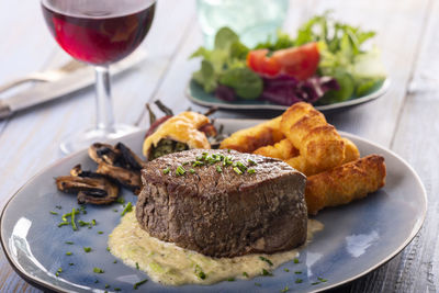 Close-up of food served on table