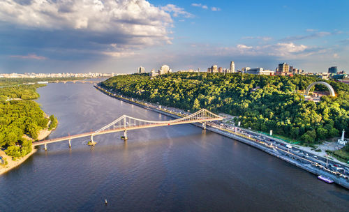 Panoramic view of bridge over river against sky