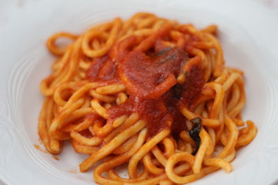 Close-up of noodles served in plate on table