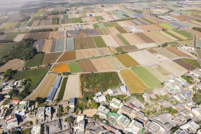 High angle view of buildings in field