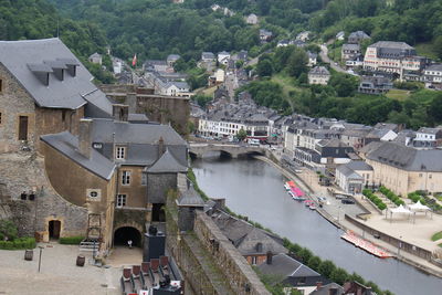 High angle view of river amidst buildings in town