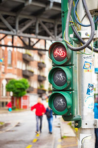 Close-up of road signal in city
