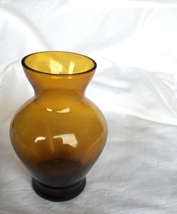 Close-up of yellow drink on table
