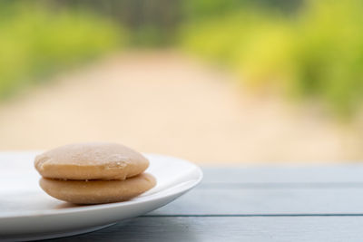 Close-up of bread in plate on table