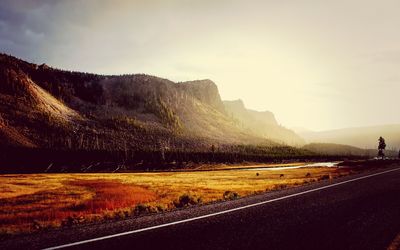 Country road passing through landscape