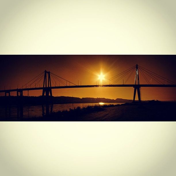 sunset, sun, connection, silhouette, water, bridge - man made structure, built structure, tranquil scene, clear sky, tranquility, scenics, architecture, sea, copy space, engineering, suspension bridge, bridge, beauty in nature, nature, sky