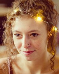 Close-up portrait of a smiling young woman