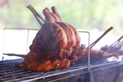 Close-up of meat on barbecue grill