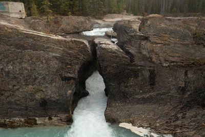 Aerial view of the lower falls natural bridge in yoho national park in canada