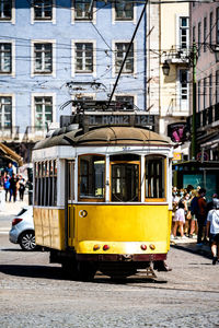 Close-up of tram on street in city