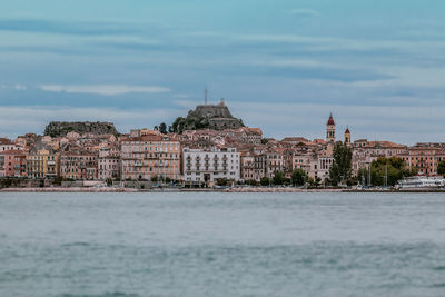 Tilt shift effect of the city of corfu with venetian fortress on a rainy day, greece