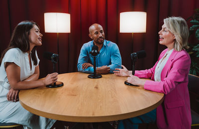 Young woman using mobile phone at home