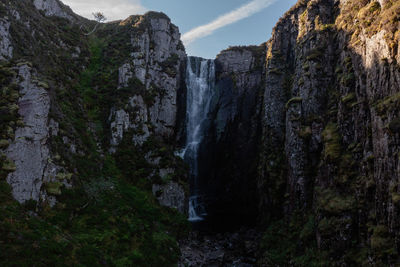 Wailing widow falls in assynt, north west highlands of scotland. falls with smoothed water, stream