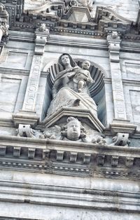 Low angle view of statue of historic building