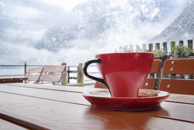 Close-up of coffee cup on table