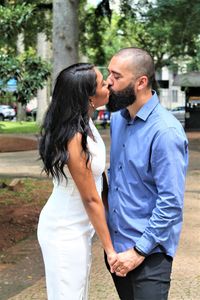 Young couple standing outdoors