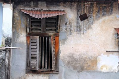 Close-up of old abandoned house